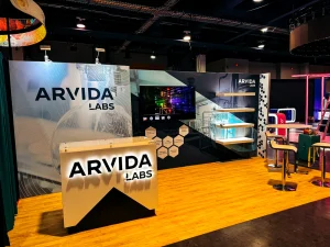 An Exhibit Crafts' portable display for trade shows featuring a modern Arvida Labs booth setup.
