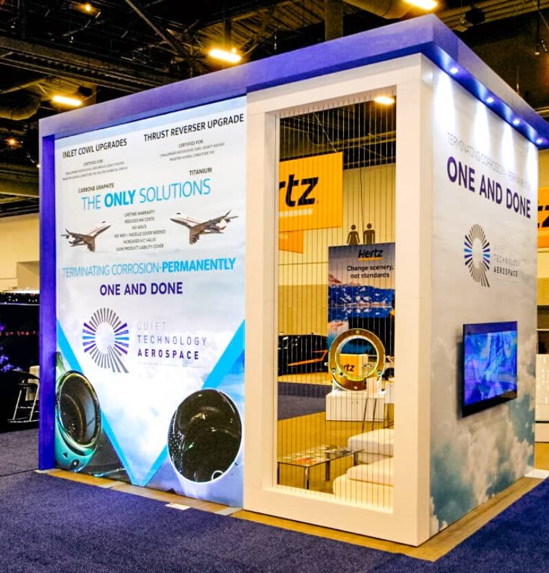 Orlando Trade Show Booth Rentals for Quiet Technology Aerospace with graphics about aircraft technology.