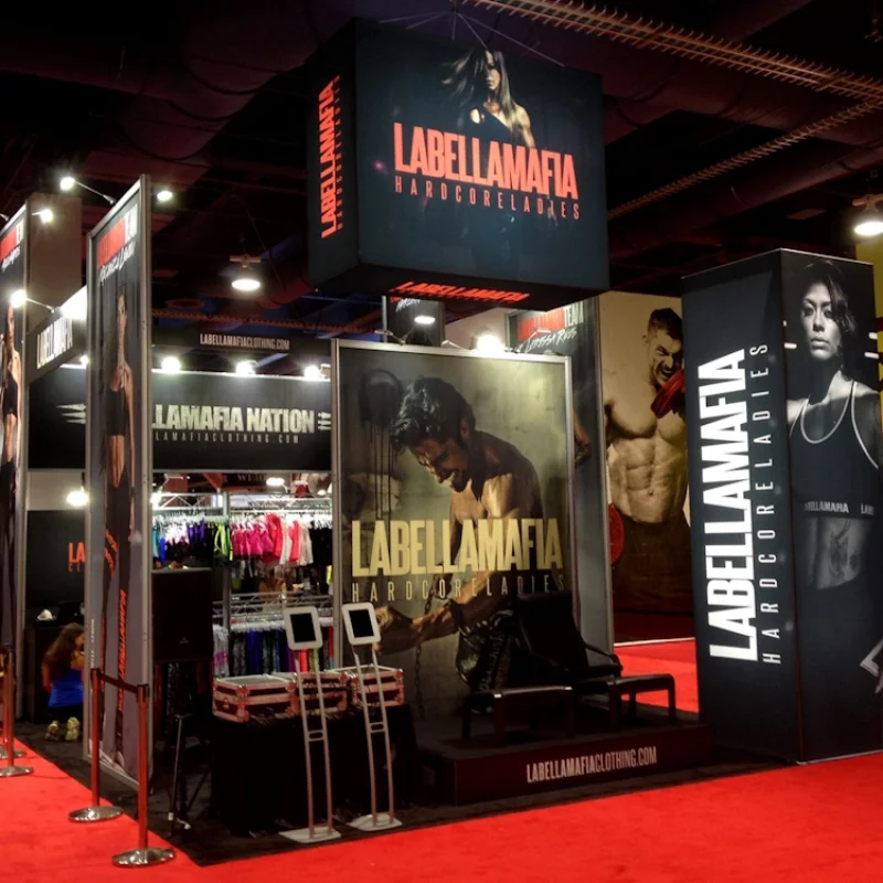 trade show display rental miami for LABELLAMAFIA with banners and athletic clothing LABELLAMAFIA trade show display rental Miami, complete with banners and athletic apparel.